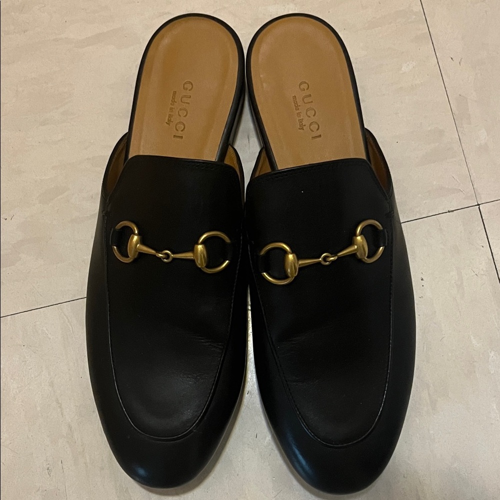 Gucci Black Leather Mules with Gold Accents